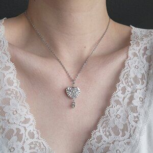 Vintage silver-plated heart necklace with a delicate chain